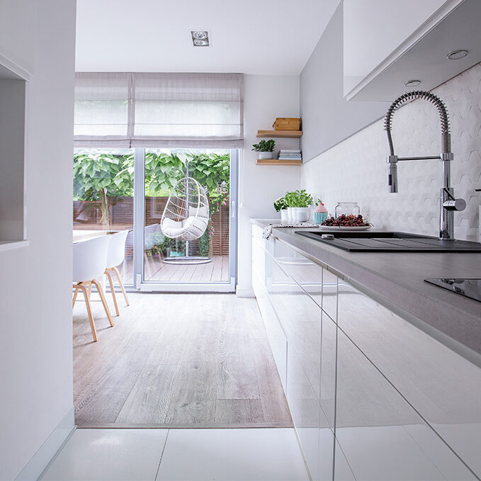 Modern kitchen looking into garden